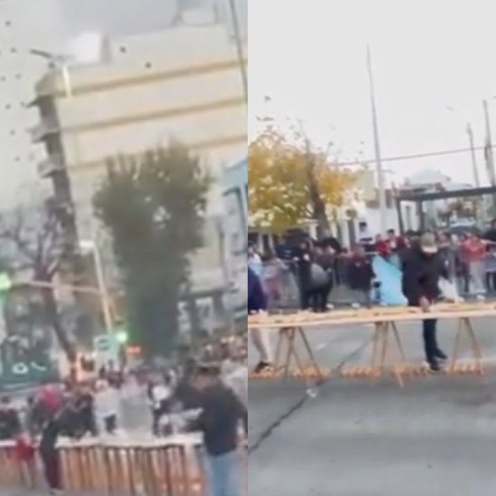 Personas saltando vallas durante la presentación de un sándwich gigante en Avellaneda